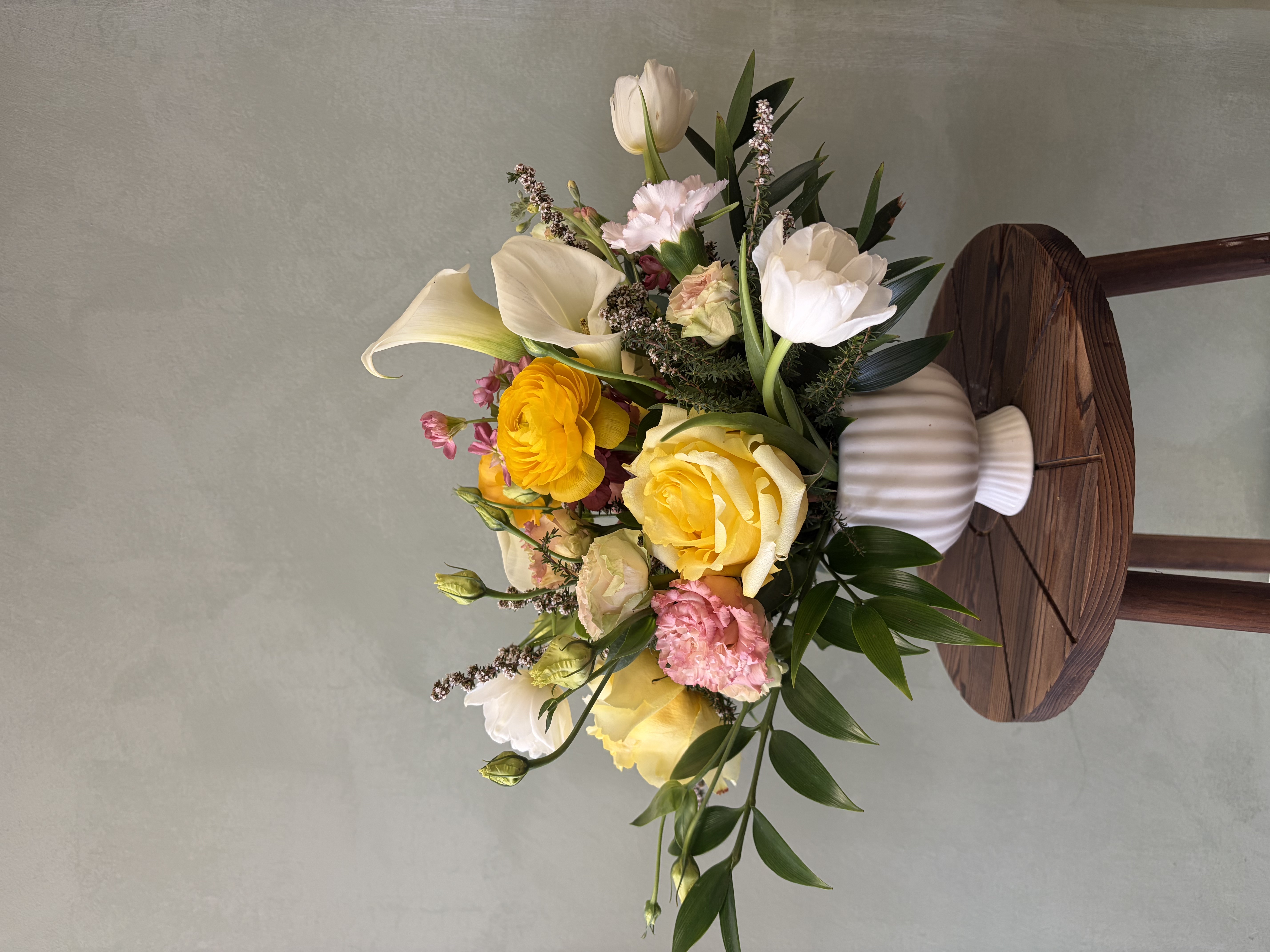 A designer preparing a sympathy arrangement